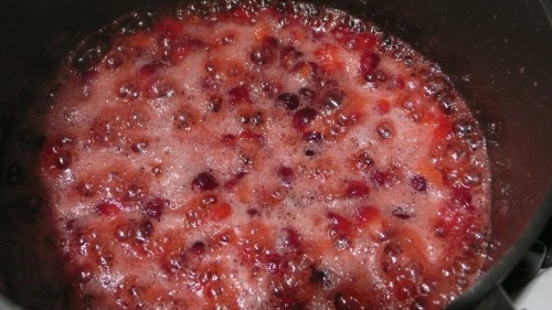 pink boiling cranberries