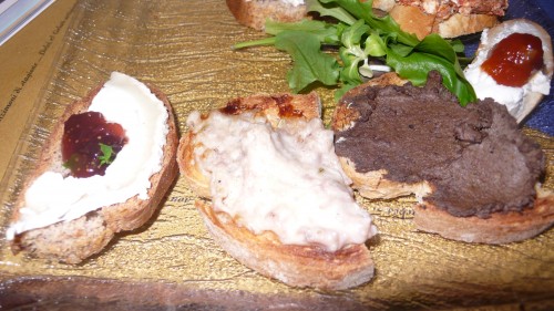 liver, sausage and cheese, and goat cheese and fig crostini