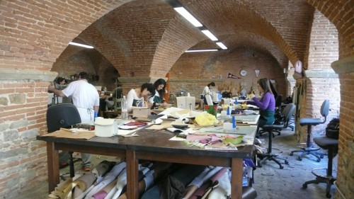 More students crafting leather items